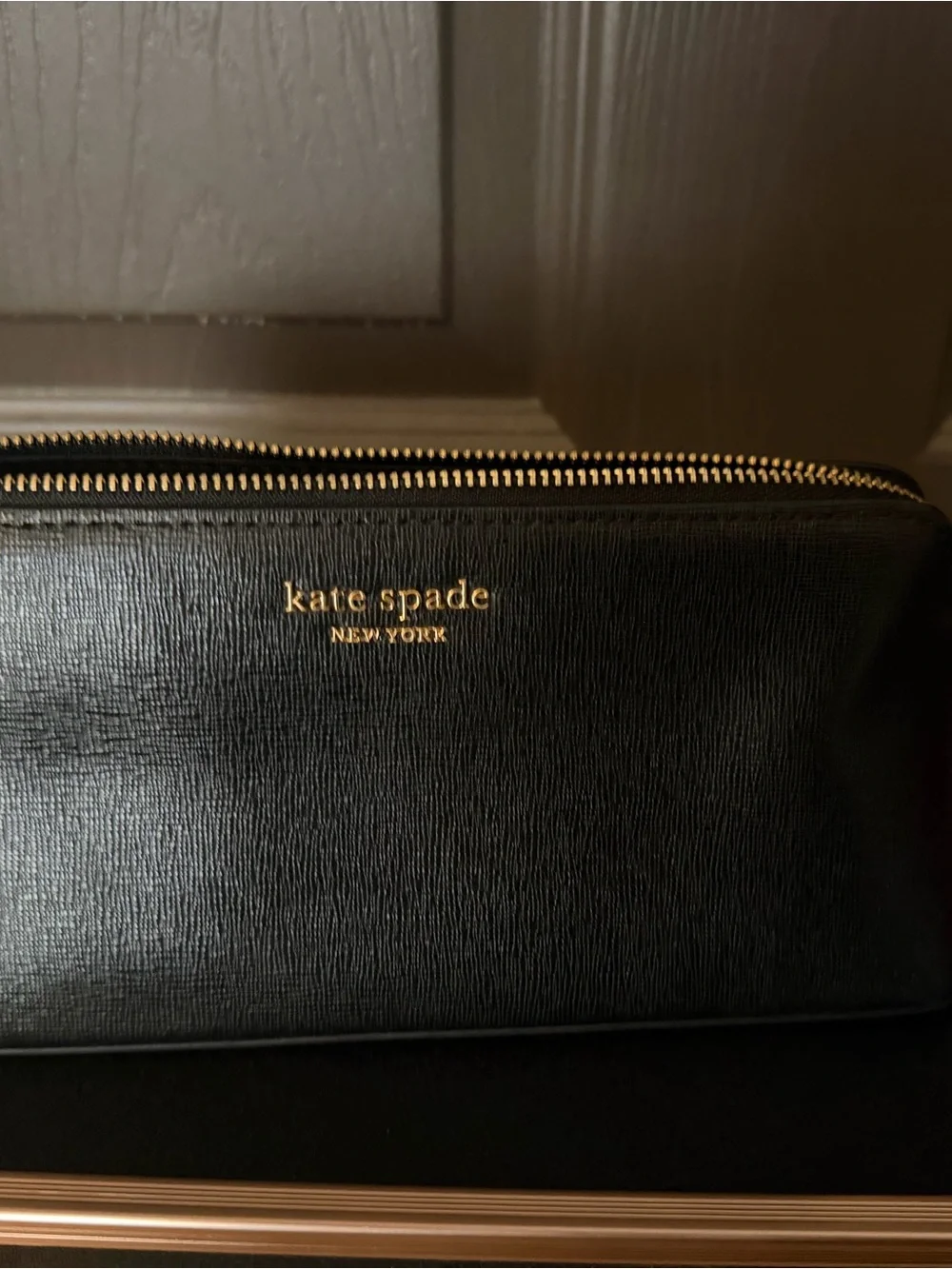 kate spade black zip cosmetic case with gold logo